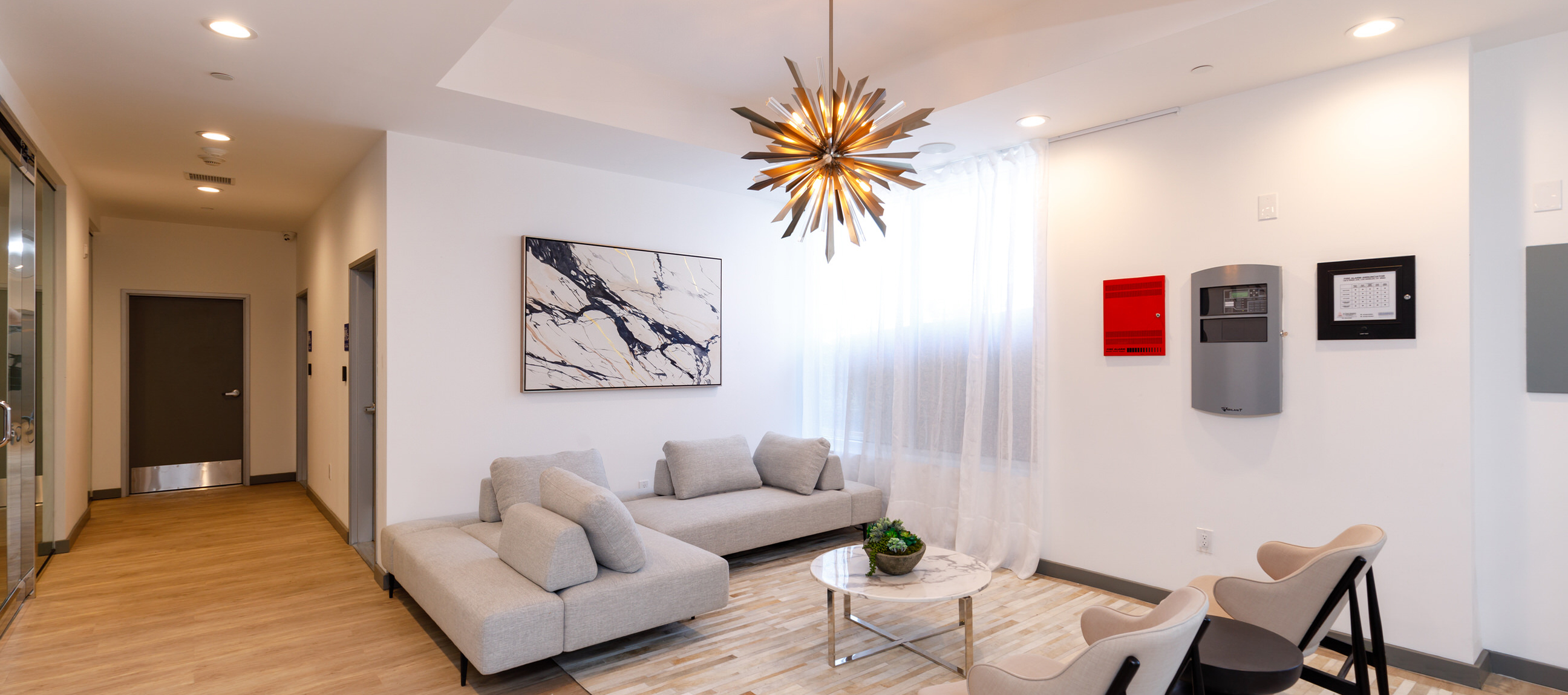 Photo of lobby seating area at Aspen Apartments in Los Angeles, CA